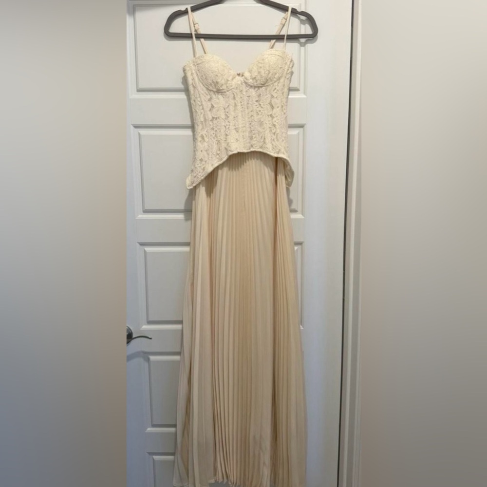Elegant Cream Lace Bustier & Pleated Maxi Dress